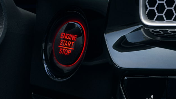 Close up of engine start button.