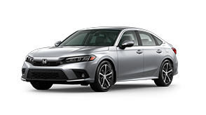 ¾ driver side front facing view of 2023 Civic Sedan Touring model in Lunar Silver Metallic colour